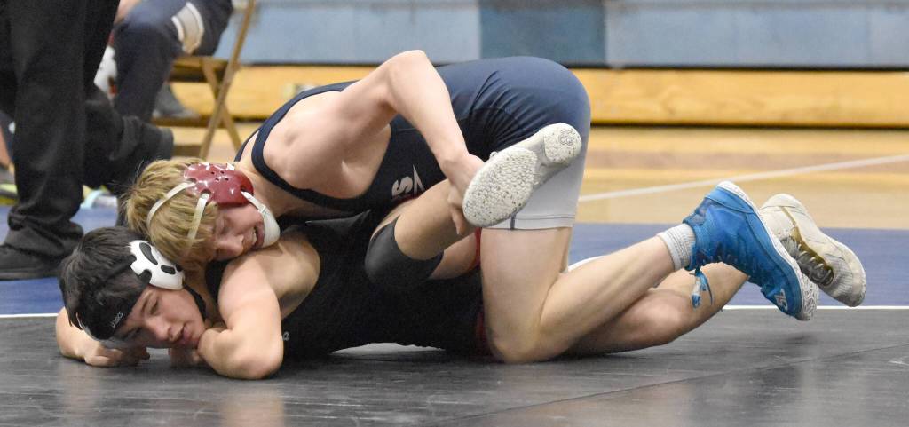 Soldotnas Jacob Strausbaugh gets a technical fall against Kenai Centrals Gunnar Stanley on Tuesday, Nov. 19, 2024, at Soldotna High School in Soldotna, Alaska. (Photo by Jeff Helminiak/Peninsula Clarion)