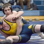 Soldotnas Titus Watts gets a technical fall over Homers Jadon Weisser on Tuesday, Nov. 19, 2024, at Soldotna High School in Soldotna, Alaska. (Photo by Jeff Helminiak/Peninsula Clarion)