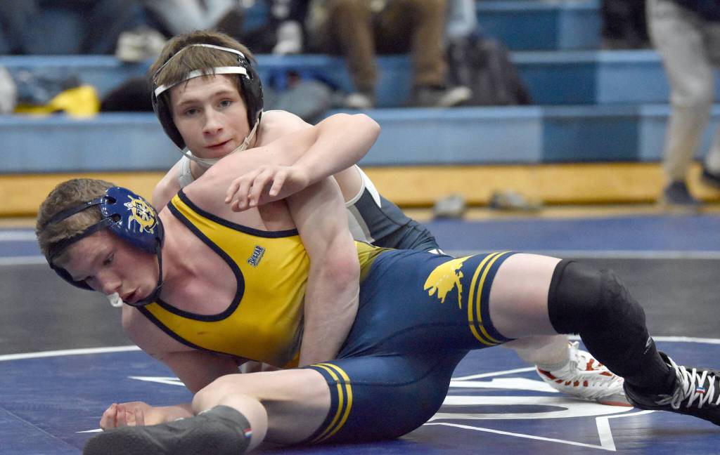 Soldotnas Titus Watts gets a technical fall over Homers Jadon Weisser on Tuesday, Nov. 19, 2024, at Soldotna High School in Soldotna, Alaska. (Photo by Jeff Helminiak/Peninsula Clarion)