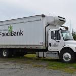 A Kenai Peninsula Food Bank truck in the Food Bank parking lot on Aug. 4, 2022 in Soldotna, Alaska (Jake Dye/Peninsula Clarion)