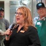 Kenai Senior Services Director Kathy Romain speaks ahead of the Hilcorp Areawide Senior Thanksgiving Luncheon in the Kenai Senior Center banquet hall in Kenai, Alaska, on Friday, Nov. 22, 2024. (Jake Dye/Peninsula Clarion)