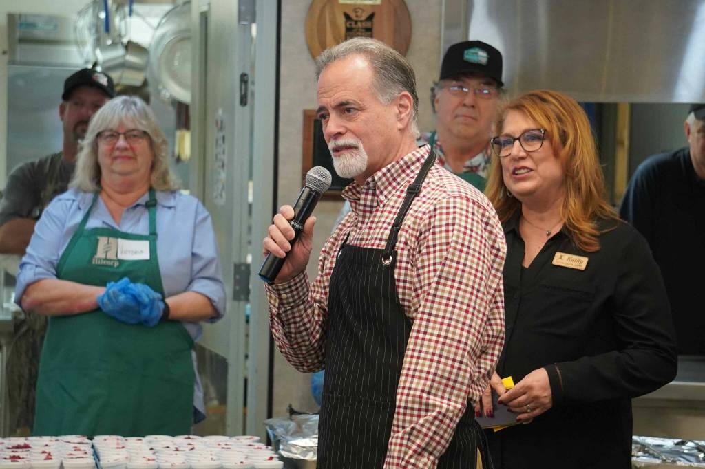 Kenai Peninsula Borough Mayor Peter Micciche speaks ahead of the Hilcorp Areawide Senior Thanksgiving Luncheon in the Kenai Senior Center banquet hall in Kenai, Alaska, on Friday, Nov. 22, 2024. (Jake Dye/Peninsula Clarion)