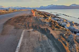 The southbound lane of Homer Spit Road, which was damaged by the Nov. 16 storm surge, is temporarily repaired with gravel and reopened on Thursday, Nov. 21, 2024, in Homer, Alaska. (Delcenia Cosman/Homer News)