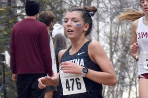 Soldotna's Annie Burns competes in the Division I girls race at the state cross-country running meet on Saturday, Oct. 5, 2024, at Bartlett High School in Anchorage, Alaska. (Photo by Jeff Helminiak/Peninsula Clarion)