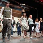 The cast of Soldotna High Schools Grease rehearse in the Soldotna High School auditorium in Soldotna, Alaska, on Monday, Nov. 25, 2024. (Jake Dye/Peninsula Clarion)