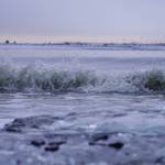 The waters of Cook Inlet crash against the shore at North Kenai Beach in Kenai, Alaska, on Tuesday, Nov. 26, 2024. (Jake Dye/Peninsula Clarion)