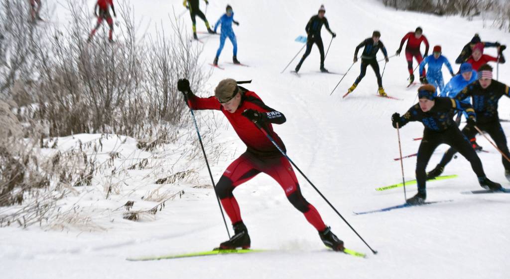 Kenai Centrals Chase Laker leads the pack at the beginning of the boys varsity race of the Turkey Skate on Tuesday, Nov. 26, 2024, at Tsalteshi Trails just outside of Soldotna, Alaska. (Photo by Jeff Helminiak/Peninsula Clarion)