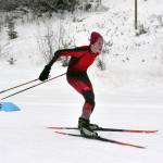 Kenai Centrals Fletcher Darr nears the finish of the boys varsity race of the Turkey Skate on Tuesday, Nov. 26, 2024, at Tsalteshi Trails just outside of Soldotna, Alaska. (Photo by Jeff Helminiak/Peninsula Clarion)