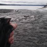 The mouth of Indian Creek in the spring, when the water is shallow and clear. By summertime, it runs faster and is more turbid. The hand and trekking pole at lower left belong to Jim Taylor, who provided this photograph.