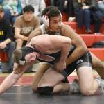 Nikiskis Rex Wittmer and Soldotnas Rodney McNeel wrestle Tuesday, Dec. 3, 2024, at Kenai Central High School in Kenai, Alaska. (Photo by Jeff Helminiak/Peninsula Clarion)