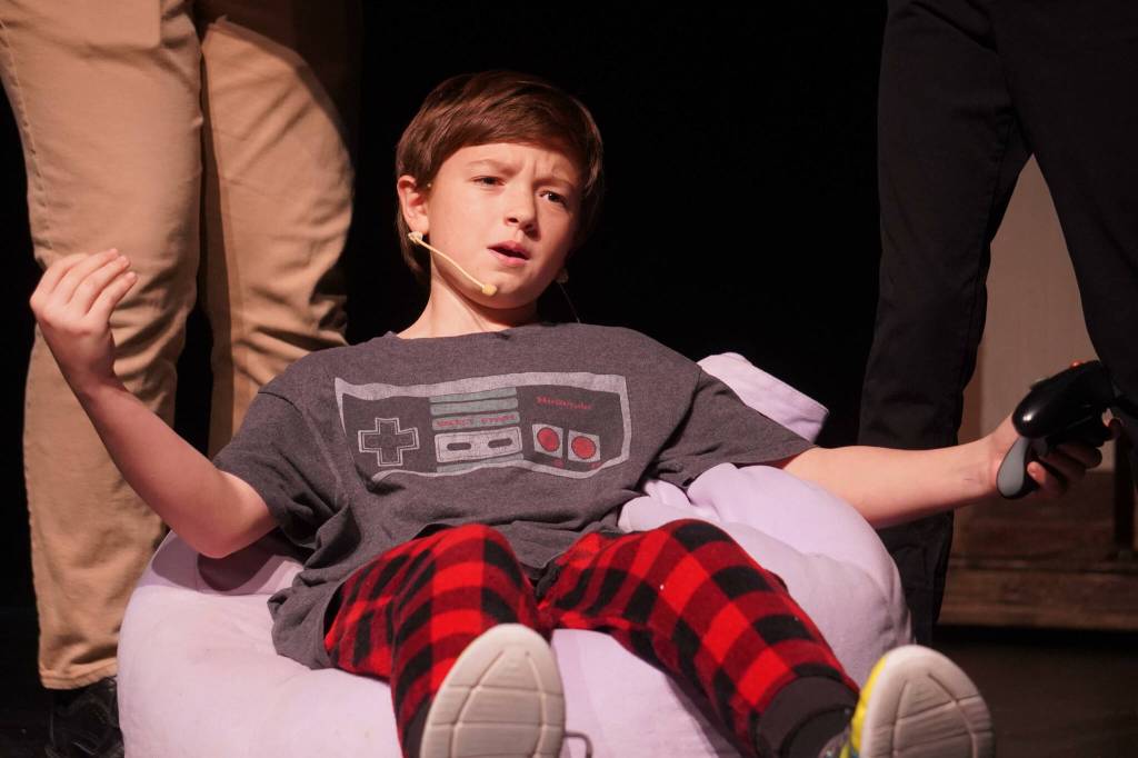 The cast of Nikiski Bulldog Theatres Willy Wonka Jr. rehearse at Nikiski Middle/High School on Tuesday, Dec. 3, 2024. (Jake Dye/Peninsula Clarion)