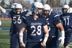 Soldotnas Wyatt Faircloth celebrates a tackle in the Division II semifinal Saturday, Oct. 19, 2024, at Justin Maile Field at Soldotna High School in Soldotna, Alaska. (Photo by Jeff Helminiak/Peninsula Clarion)