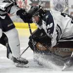 Soldotna goalie Brycen Clyde tracks the puck for a save Friday, Dec. 6, 2024, at the Soldotna Regional Sports Complex in Soldotna, Alaska. (Photo by Jeff Helminiak/Peninsula Clarion)