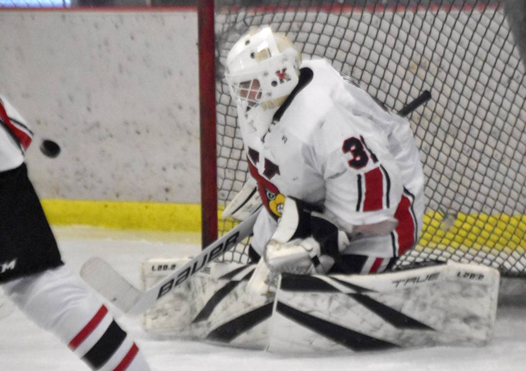 Kenai Central goalie Evyn Witt makes a save Saturday, Dec. 7, 2024, at the Kenai Multi-Purpose Facility in Kenai, Alaska. (Photo by Jeff Helminiak/Peninsula Clarion)