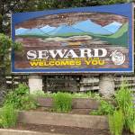 A sign welcomes visitors on July 7, 2021, in Seward, Alaska. (Photo by Jeff Helminiak/Peninsula Clarion)