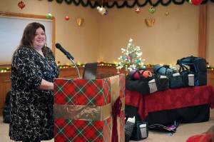 Kelly King speaks to the Kenai Peninsula Association of Realtors on behalf of the Kenai Peninsula Borough School Districts Students in Transition at Kenai Catering on Thursday, Dec. 14, 2023. (Jake Dye/Peninsula Clarion)