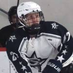 Juneau-Douglas defenseman Carter Miller (6) was tripped into a collision with Soldotna's Keegan Myrick (27) during the Crimson Bears' 2-0 win over the Stars on Saturday, Dec. 14, 2024, at Treadwell Ice Arena in Juneau, Alaska. (Klas Stolpe / Juneau Empire)