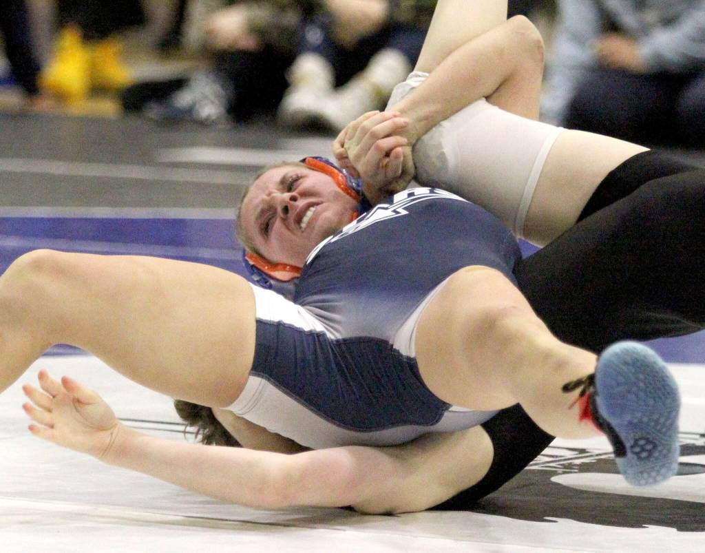 Soldotnaճ Mia Hannevold battles Colonyճ Hayden VanderPool during the girls 114-pound final of the Northern Lights Conference Championships Saturday, Dec. 14, 2024, at Palmer High School in Palmer, Alaska. (Photo by Jeremiah Bartz/Frontiersman)
