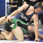 Soldotnas Michael Dickinson controls the leg of Colonys Tristen Mayer during the 152-pound final of the Northern Lights Conference Championships on Saturday, Dec. 14, 2024, at Palmer High School in Palmer, Alaska. (Photo by Jeremiah Bartz/Frontiersman)