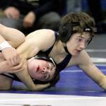 Soldotnas Ryan Buchanan works to pin Kodiaks Luke Lester during the boys 119-pound final of the Northern Lights Conference Championships Saturday, Dec. 14, 2024, at Palmer High School in Palmer, Alaska. (Photo by Jeremiah Bartz/Frontiersman)