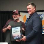 Joe Gilman is named Person of the Year during the 65th Annual Soldotna Chamber Awards Celebration at the Soldotna Regional Sports Complex on Wednesday. (Jake Dye/Peninsula Clarion)