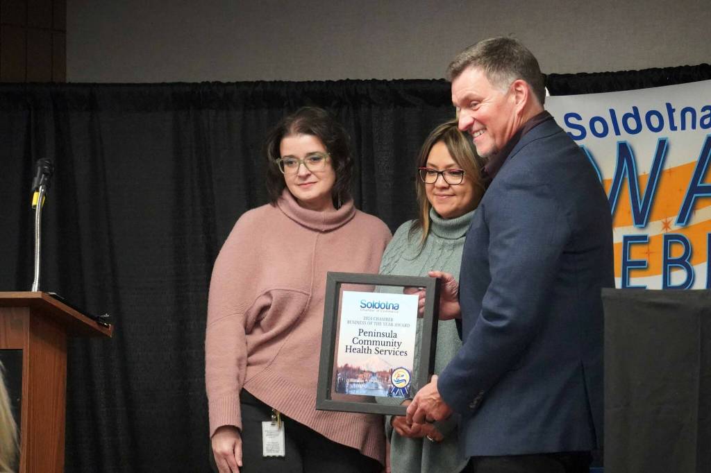 Peninsula Community Health Services is recognized Chamber Business of the Year during the 65th Annual Soldotna Chamber Awards Celebration at the Soldotna Regional Sports Complex in Soldotna, Alaska, on Wednesday, Dec. 18, 2024. (Jake Dye/Peninsula Clarion)