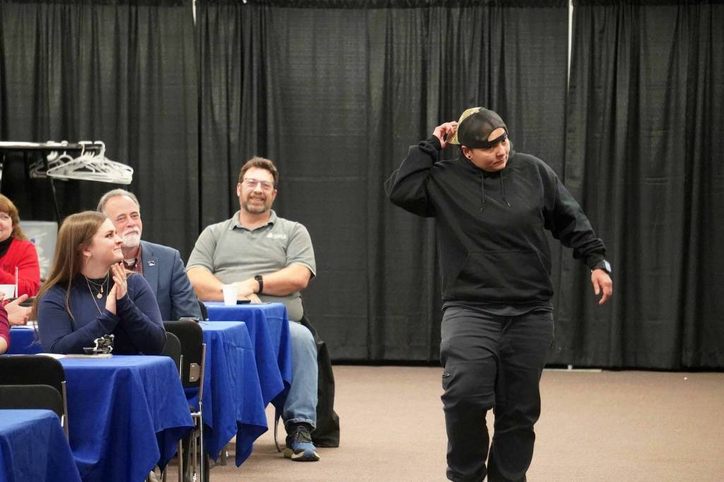 Nila Sanchez receives the Dan Gensel Commitment to Youth Award during the 65th Annual Soldotna Chamber Awards Celebration at the Soldotna Regional Sports Complex in Soldotna, Alaska, on Wednesday, Dec. 18, 2024. (Jake Dye/Peninsula Clarion)