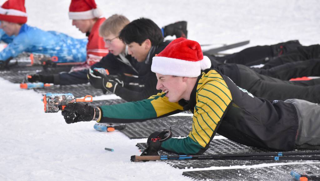 Seward's Marty Fink takes aim at the Candy Cane Scramble on Friday, Dec. 20, 2024, at Tsalteshi Trails just outside of Soldotna, Alaska. (Photo by Jeff Helminiak/Peninsula Clarion)