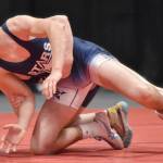 Soldotnas Hunter Bras (rear) wrestles to a 6-5 decision over Soldotnas Trevor Michael in the final at 160 pounds at the Division I state wrestling tournament Saturday, Dec. 21, 2024, at the Alaska Airlines Center in Anchorage, Alaska. (Photo by Jeff Helminiak/Peninsula Clarion)