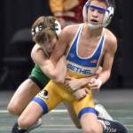 Sewards Tommy Jarnig wrestles to a 13-7 decision over Bethels Cole Iverson in the final at 103 pounds at the Division II state wrestling tournament Saturday, Dec. 21, 2024, at the Alaska Airlines Center in Anchorage, Alaska. (Photo by Jeff Helminiak/Peninsula Clarion)