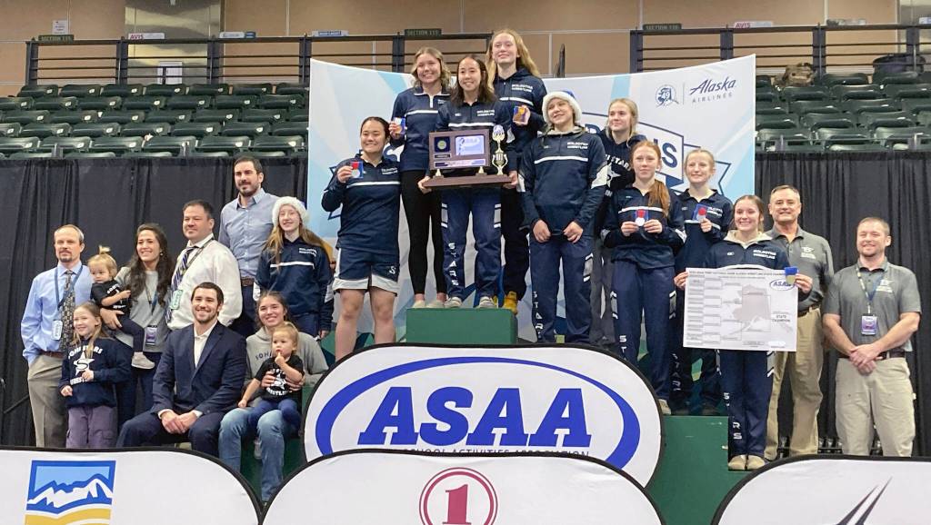 The Soldotna girls won the team title at the girls state wrestling tournament Saturday, Dec. 21, 2024, at the Alaska Airlines Center in Anchorage, Alaska. (Photo by Jeff Helminiak/Peninsula Clarion)