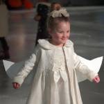The Tuesday Night Tots perform One Little Christmas Tree during the 23rd Annual Christmas Lights and Holiday Nights Skating Recital at the Soldotna Regional Sports Complex in Soldotna, Alaska, on Saturday, Dec. 21, 2024. (Jake Dye/Peninsula Clarion)