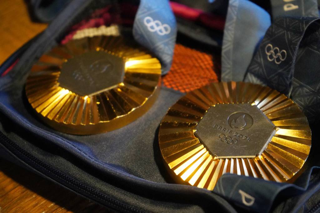 Kristen Faulkners two gold medals from the Paris 2024 Olympics are seen during a meet and greet hosted by the Kenai and Soldotna chambers of commerce at the Cannery Lodge in Kenai, Alaska, on Saturday, Dec. 28, 2024. (Jake Dye/Peninsula Clarion)