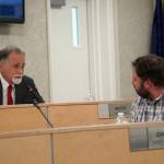 Kenai Peninsula Borough Mayor Peter Micciche offers well wishes to Bill Elam, who resigned from the borough assembly after being elected to the Alaska Legislature, during a meeting of the Kenai Peninsula Borough Assembly in Soldotna, Alaska, on Tuesday, Jan. 7, 2024. (Jake Dye/Peninsula Clarion)