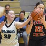Kenai Centrals Bryleigh Williams tries to keep Nikiskis Avery Ellis from stealing the ball Thursday, Jan. 9, 2025, at Nikiski Middle-High School in Nikiski, Alaska. (Photo by Jeff Helminiak/Peninsula Clarion)