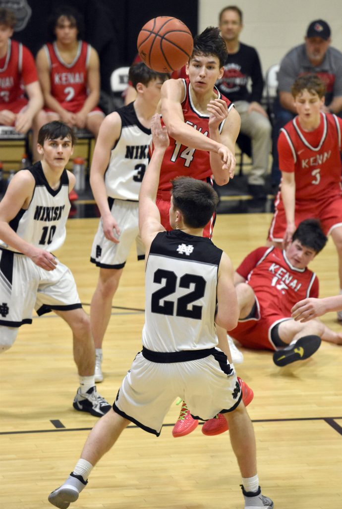 Kenai Centrals Miles Metteer whips a pass to the corner against Nikiski on Thursday, Jan. 9, 2025, at Nikiski Middle-High School in Nikiski, Alaska. (Photo by Jeff Helminiak/Peninsula Clarion)