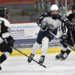 Soldotnas Peyton Williams splits Souths Nick Yohman and Alex Green on Friday, Jan. 10, 2025, at the Soldotna Regional Sports Complex in Soldotna, Alaska. (Photo by Jeff Helminiak/Peninsula Clarion)