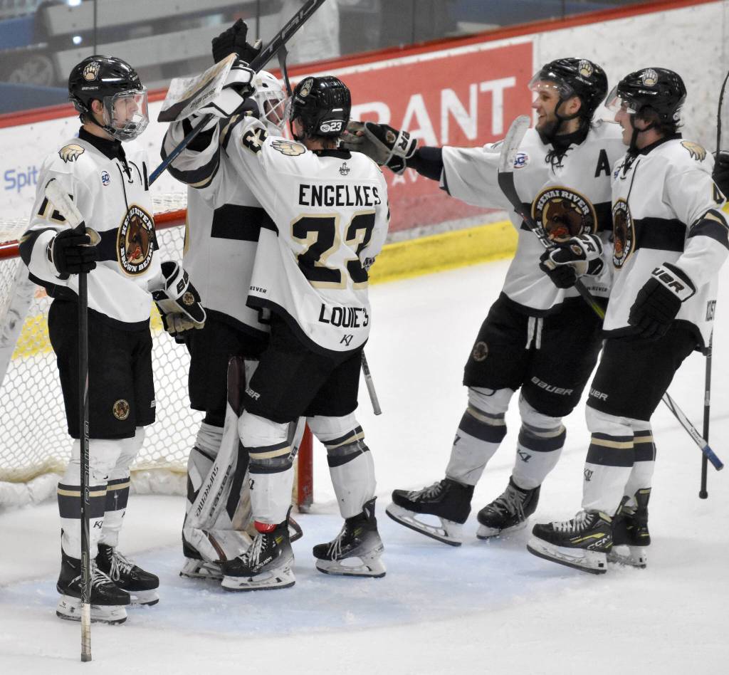 The Kenai River Brown Bears congratulate goalie Owen Zenone on his shutout Saturday, Jan. 11, 2025, at the Soldotna Regional Sports Complex in Soldotna, Alaska. (Photo by Jeff Helminiak/Peninsula Clarion)