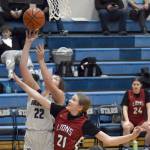 Soldotnas Ryan Queen shoots against Jayda Pastana of Mountain City Christian Academy on Friday, Jan. 17, 2025, at Soldotna High School in Soldotna, Alaska. (Photo by Jeff Helminiak/Peninsula Clarion)