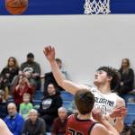 Soldotnas Will Klein battles for the ball with Stryder Kronburger of Mountain City Christian Academy on Friday, Jan. 17, 2025, at Soldotna High School in Soldotna, Alaska. (Photo by Jeff Helminiak/Peninsula Clarion)