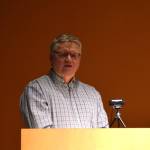 Steve Delehanty, the former manager of the Alaska Maritime National Wildlife Refuge Visitor Center, addresses a crowd gathered to celebrate his public service on Tuesday, Jan. 21. (Chloe Pleznac/Homer News)