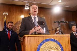 Gov. Mike Dunleavy speaks during a press conference Dec. 12, 2024, at the Alaska State Capitol. (Mark Sabbatini / Juneau Empire file photo)