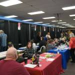 Dozens of booths and vendors offering services fill the 14th Annual Project Homeless Connect at the Soldotna Regional Sports Complex in Soldotna, Alaska, on Tuesday, Jan. 28, 2025. (Jake Dye/Peninsula Clarion)