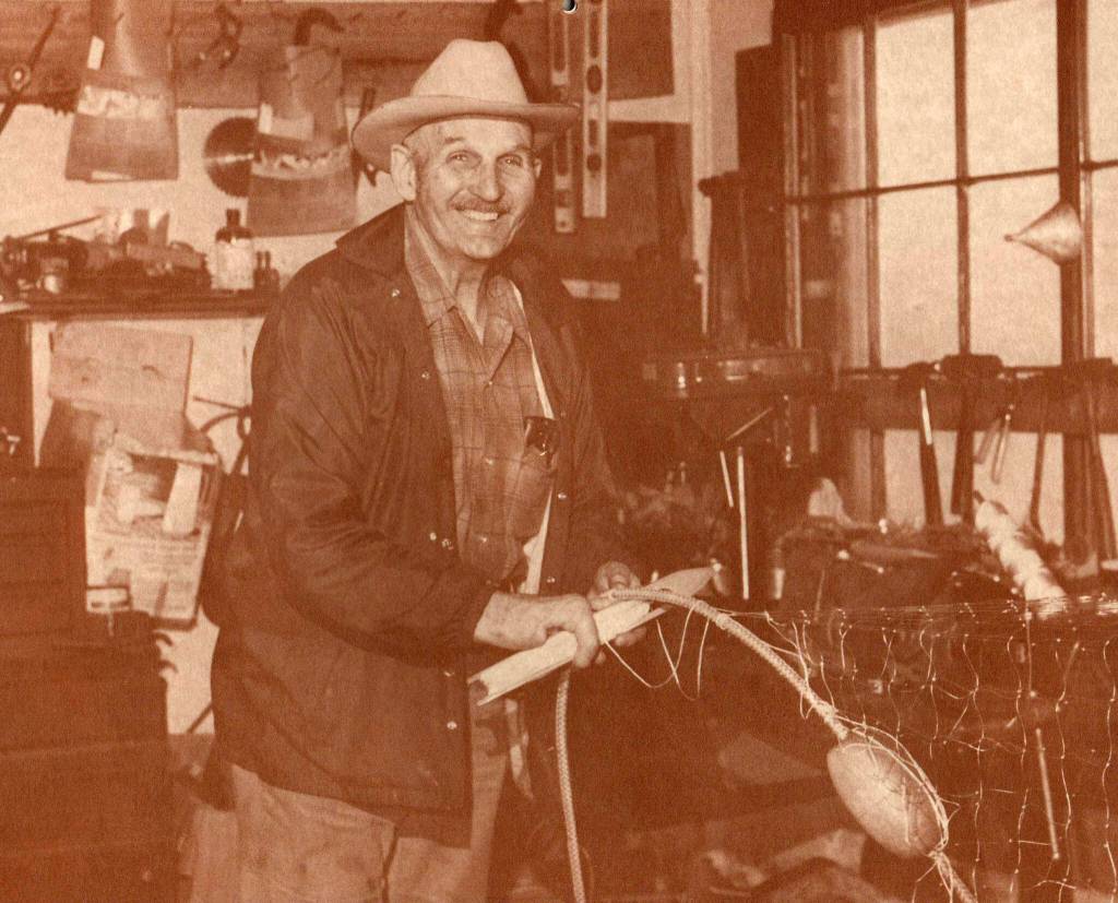 Poopdeck Platt, mending a fishing net, was featured in January in the 1985 Caldwell-Rosen Homer Calendar.