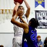 Ninilchiks Kade McCorison puts up a shot against Nanwalek on Saturday, Feb. 1, 2025, at Ninilchik School in Ninilchik, Alaska. (Photo provided by Robin Moore)