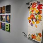 From right, artwork by Vickie Roney, Jan Wallace and Niko Xlotnik is displayed as part of Fiber at the Kenai Art Center in Kenai, Alaska, on Wednesday, Feb. 5, 2025. (Jake Dye/Peninsula Clarion)