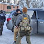 A person is detained in Anchorage in recent days by officials from the FBI and U.S. Department of Homeland Security. (FBI Anchorage Field Office photo)