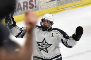 Soldotna's Noah Crabtree celebrates the game-winning goal in overtime Friday, Feb. 7, 2025, at the First National Cup Division II state hockey tournament at the Soldotna Regional Sports Complex in Soldotna, Alaska. (Photo by Jeff Helminiak/Peninsula Clarion)