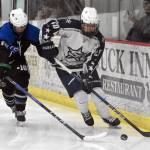 Soldotnas Peter Perez-Bailon carries the puck against Palmers Liam Hilscher at the First National Cup Division II state hockey tournament Saturday, February 8, 2025, at the Soldotna Regional Sports Complex in Soldotna, Alaska. (Photo by Jeff Helminiak/Peninsula Clarion)