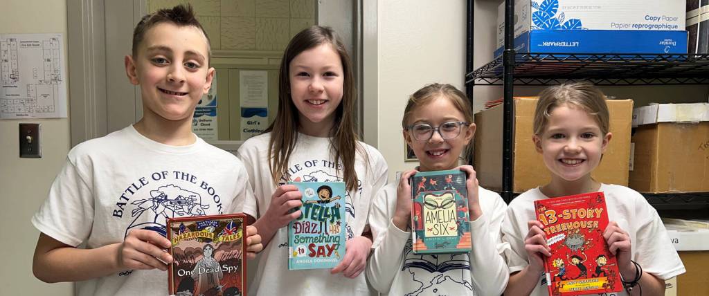 The third and fourth grade Battle of the Books team from Aurora Borealis Charter School, who won the district competition in February, stand for a photo. (Provided by Districtwide Librarian Julie Gottfried)